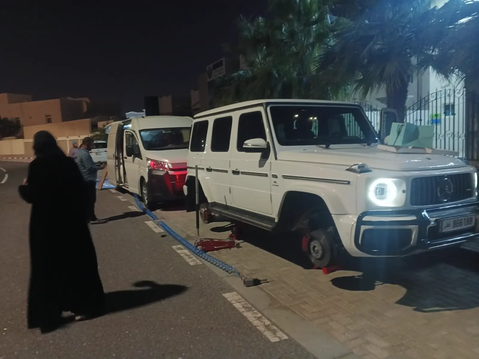 Night mobile puncture repair — service van and G-Wagon in Doha