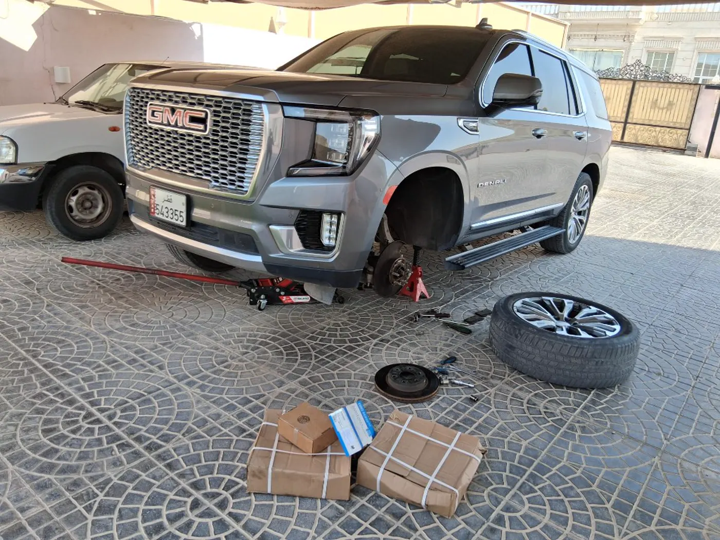 GMC Yukon Denali mobile tire and brake service in Qatar